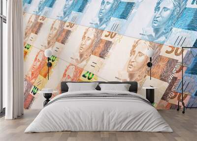 texture or background with Brazilian money banknotes, 100, 50, 20, 10 5 and 2 reais. Brazilian currency paper Wall mural