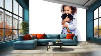 Portrait of a cute little african american girl hugging doll, isolated on white background. Wall mural