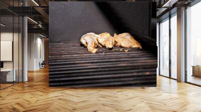 Chicken Barbecue. Seasoned raw food placed on the barbecue grill Wall mural