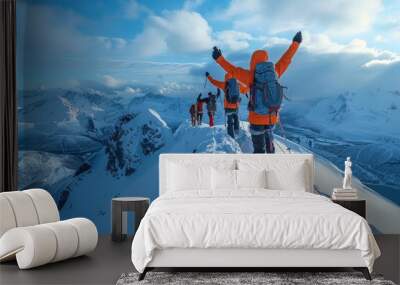 Group of mountaineers celebrating reaching the top of snowy mountain peak Wall mural