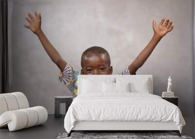 Laughing Cheerful African black boy is Incredibly Happy with Copy Space Wall mural