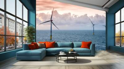 Sunset over offshore wind farm - green power generation Wall mural