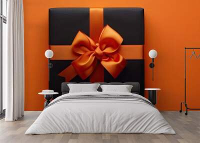 Black Gift Box on Orange Background Wall mural