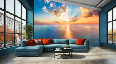 aerial panoramic view of sunset over ocean colorful sky clouds water beautiful serene scene wide angle seascape drone view majestic stunning nature background best sea sky sunrise inspire views Wall mural