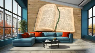 Prayer book on wood Wall mural