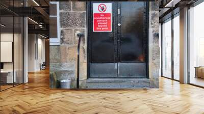 Building closed no entry sign on building door Wall mural