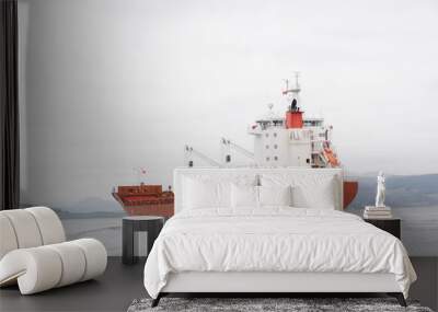 Cargo ship vessel freight containers carrier transport on sea ocean to port dock Wall mural