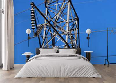 high tension power lines against a blue sky background Wall mural