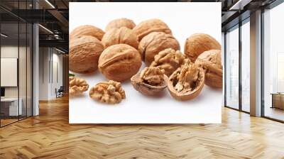 raw walnut kernels and walnuts isolated on white background Wall mural