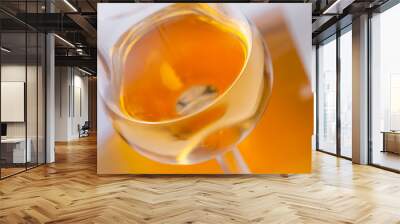 glasses and bottles with orange wine Wall mural