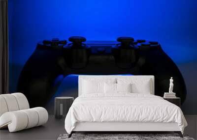 Video game controller with blue light emitting Wall mural