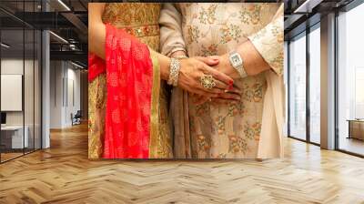 hands of woman in traditional dress Wall mural