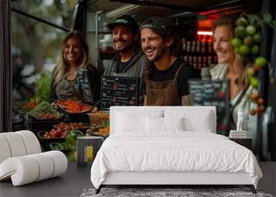 A community of smiling people gathers in front of a food truck at a market event, sharing whole foods and natural cuisine on ecofriendly tableware Wall mural