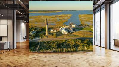 Oak Island North Carolina lighthouse view from the air. The inter coastal waterway is in the background. Wall mural