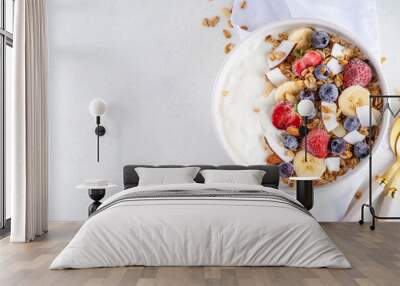 Breakfast yogurt granola bowl with fruit and berry Wall mural