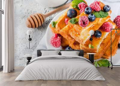 healthy summer breakfast, baked french toasted bread sticks with fresh berry and honey, morning ligh Wall mural