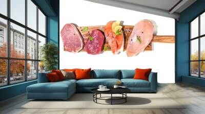 Various natural food, high animal protein sources - pork, beef meat steaks, chicken breast fillet, eggs, salmon fish on white table background top view copy space Wall mural