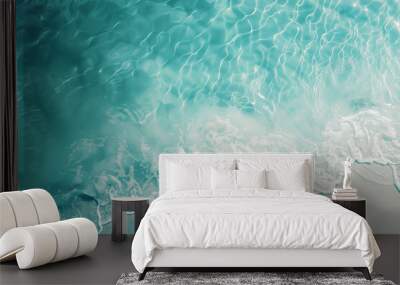 crystal blue water as ocean ripples over sand at beach Wall mural