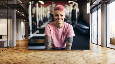 person with pink hair smiling at inclusive gym Wall mural