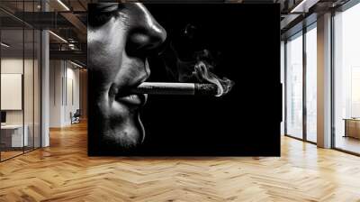 side view of older man smoking cigarette isolated on black background, in black and white noir Wall mural