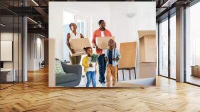 Black family with two children moving house Wall mural