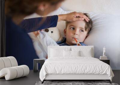 boy measuring fever Wall mural