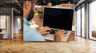 Business man typing on blank screen Wall mural