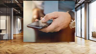 Businessman With His Smartphone Wall mural