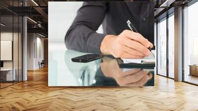 Businessman Writing a Paperwork Wall mural