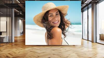 Carefree stylish woman enjoying summer Wall mural