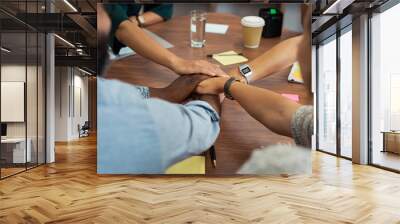 Casual business people stacking hands Wall mural