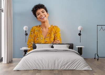 Cheerful african woman smiling Wall mural