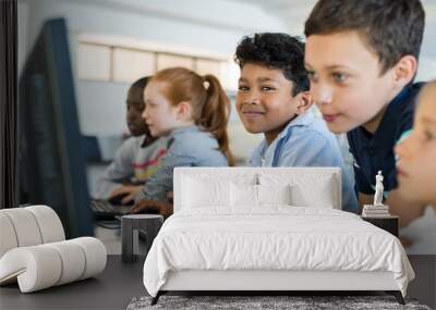 Children using computer in school Wall mural