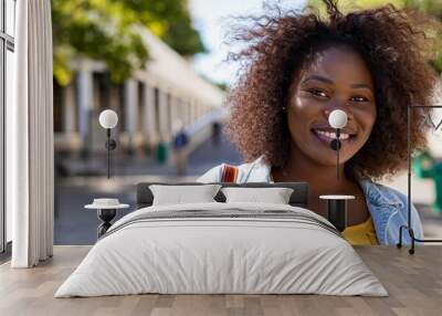 Curvy happy black woman Wall mural