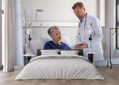 doctor discussing diagnosis with patient Wall mural