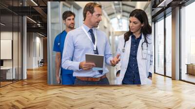 Doctor in a conversation with specialist Wall mural