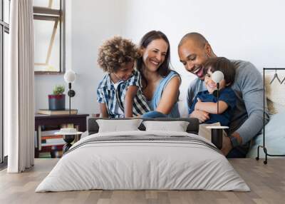 Family having fun at home Wall mural