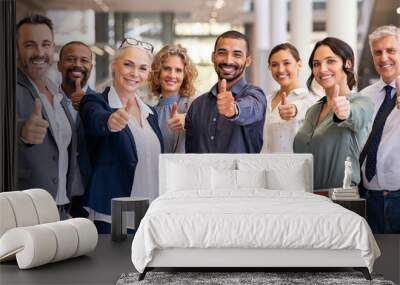 Group of successful business people showing thumbs up Wall mural