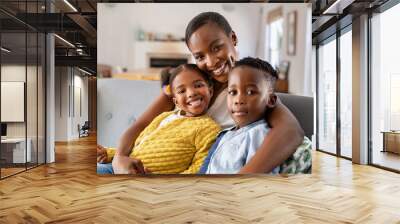 Happy african american mother with little son and smiling daughter Wall mural