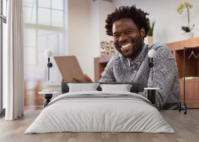 Happy african businessman in casual Wall mural