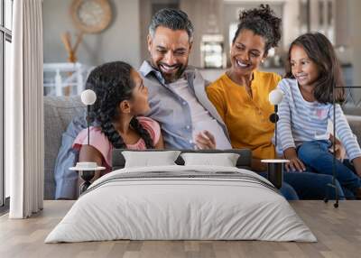 Happy joyful mixed race family having fun together Wall mural