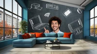 Happy man with computer technology Wall mural