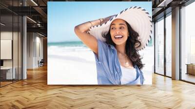 Happy stylish woman enjoy the beach with copy space Wall mural