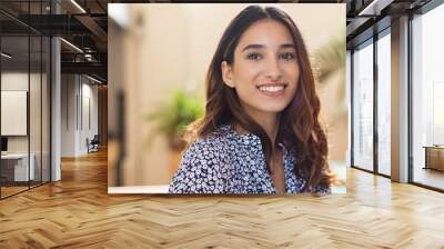 Happy young woman smiling Wall mural