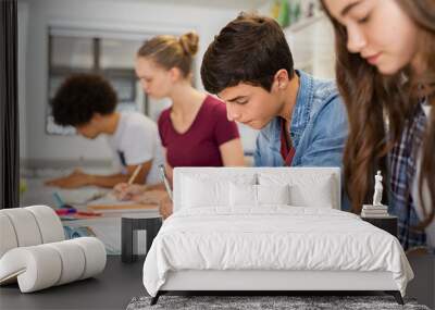 High school students doing exam in classroom Wall mural