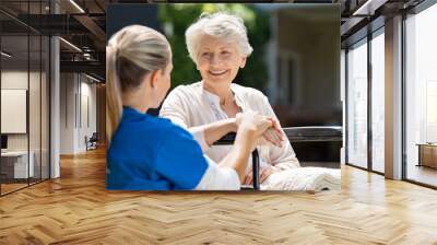 nurse takes care of old patient Wall mural