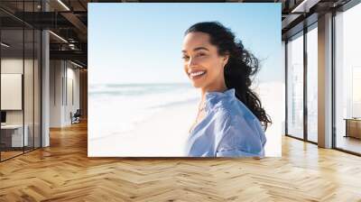 Portrait of natural beauty woman at beach Wall mural