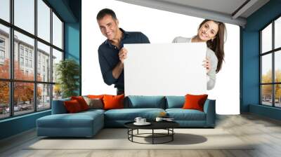 satisfied couple holding a placard Wall mural