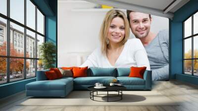 serene young smiling couple Wall mural