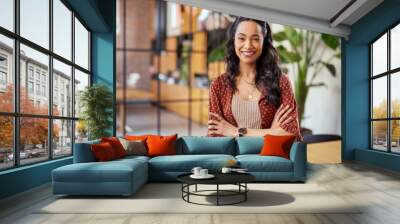 Smiling confident latin woman looking at camera Wall mural